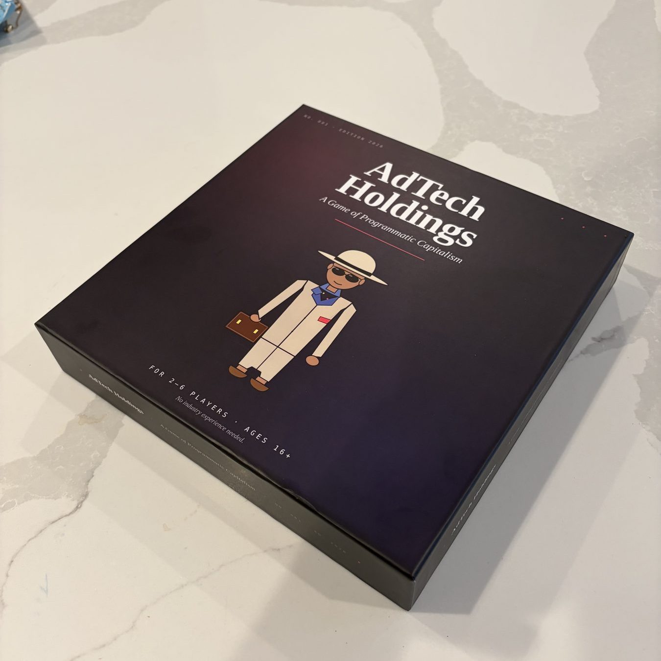 AdTech Holdings board game box
